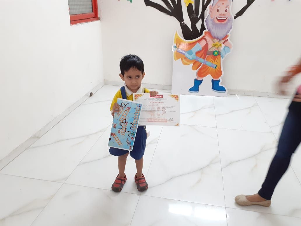 A young author receiving a certificate at school