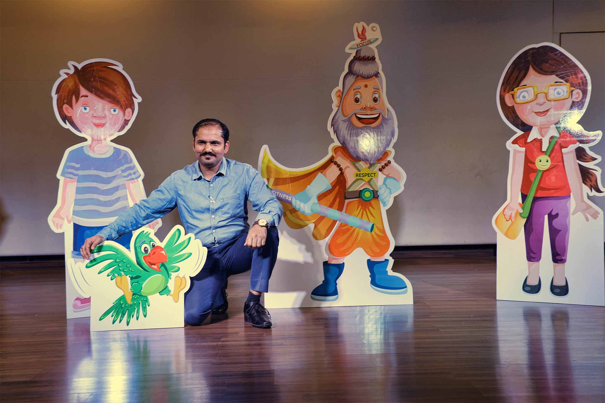 Workshop facilitator with GullyBaba Kids story characters at Dwarka International School, Delhi