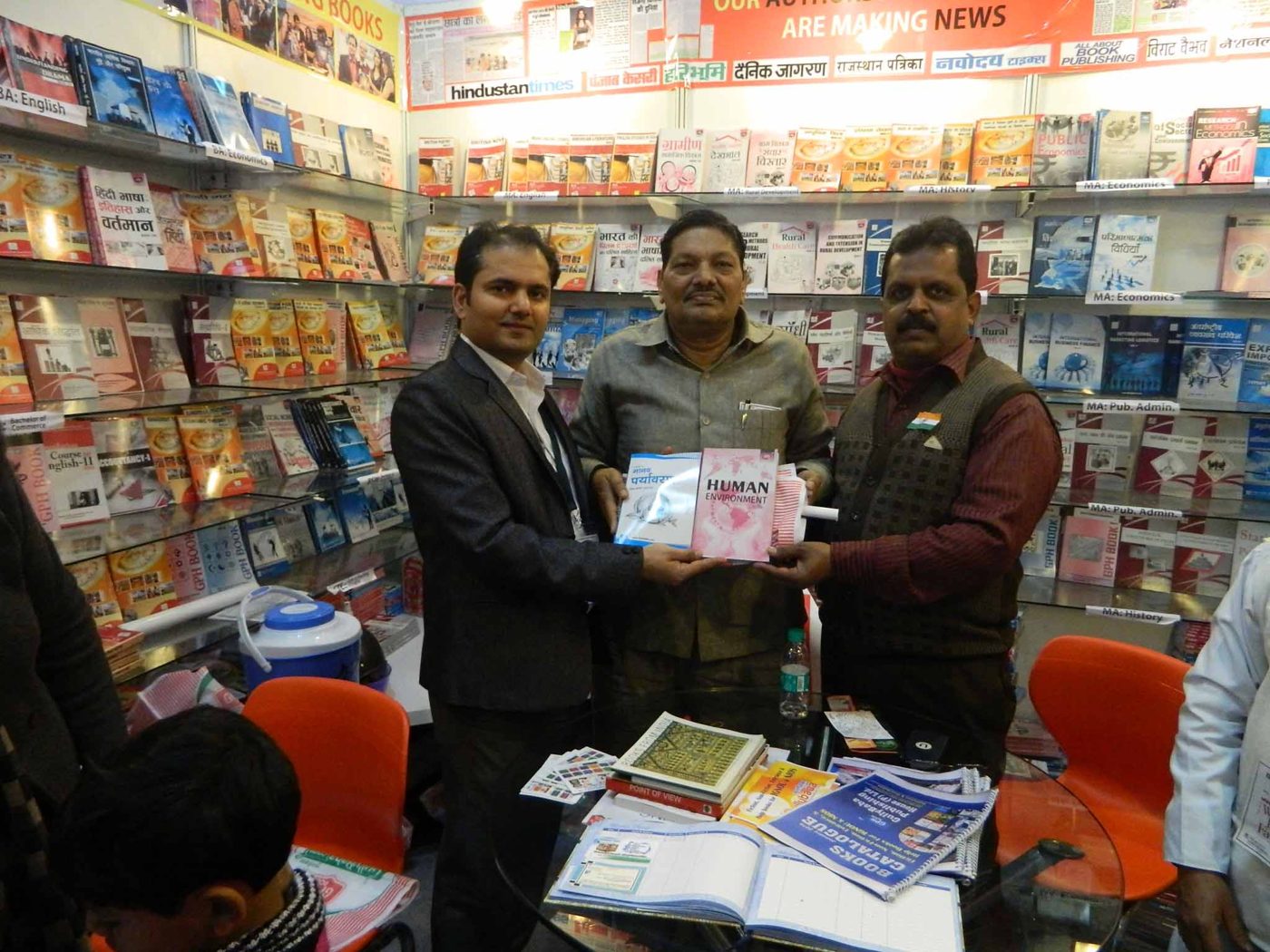 A GullyBaba Kids book being presented to a guest at the World Book Fair
